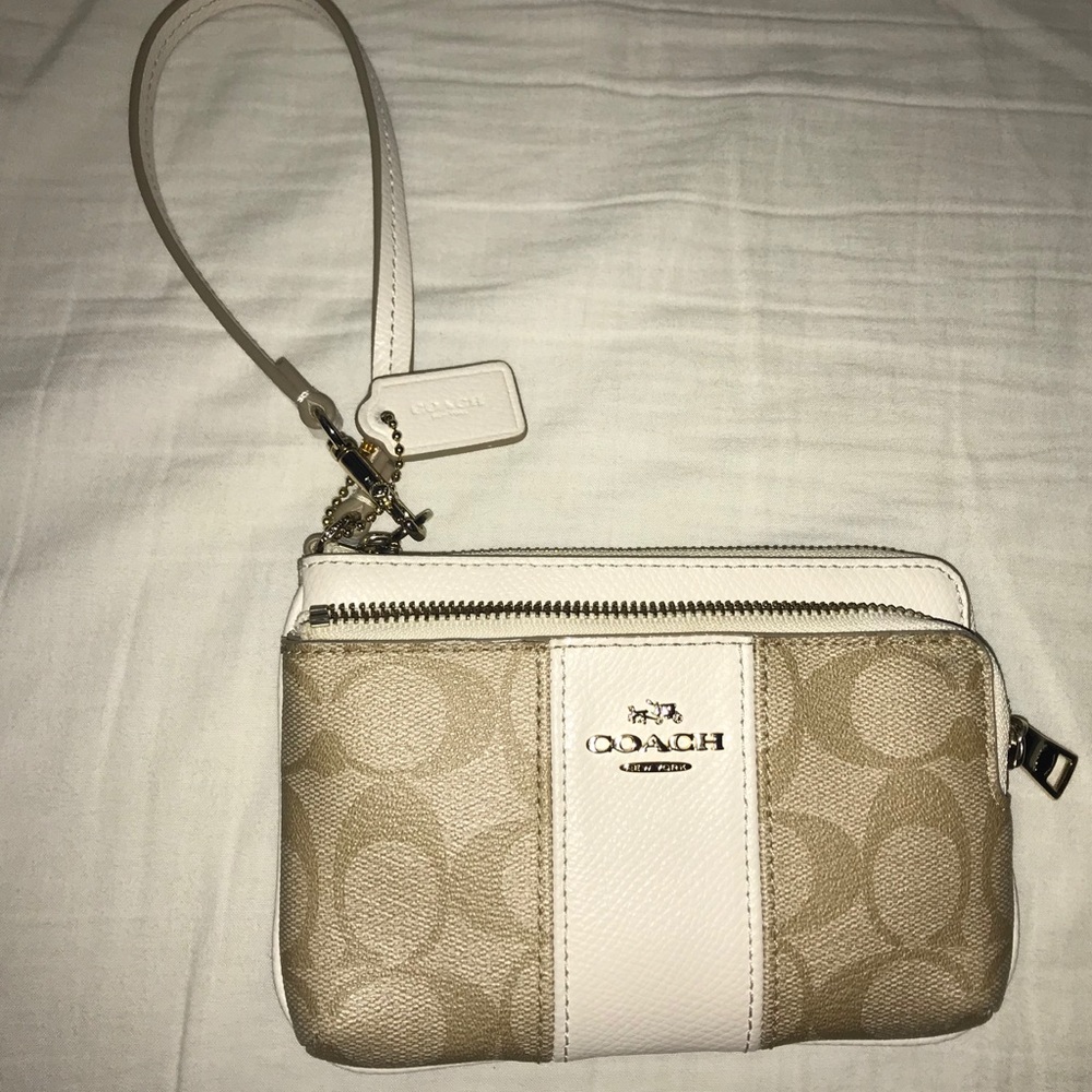 Coach cream and white wristlet